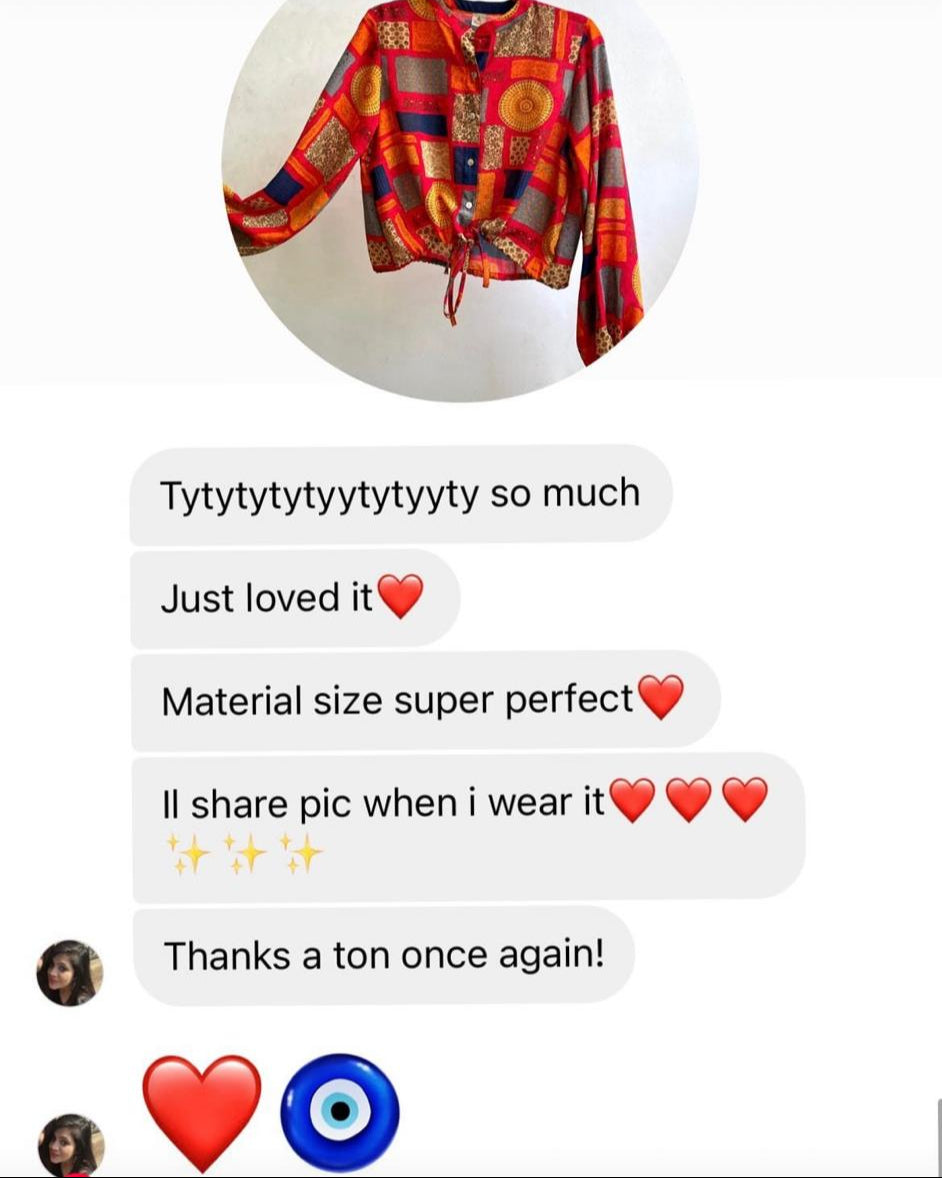 Colorful patterned shirt on a hanger with text feedback below